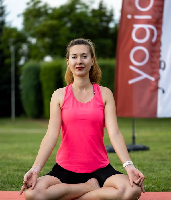 Woman in a calm yoga pose, embodying inner harmony.
